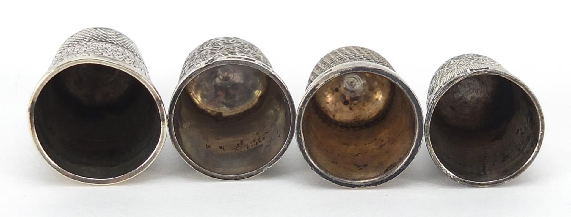 Four silver thimbles, the largest 2.5cm high, total 15.5g - Image 5 of 5