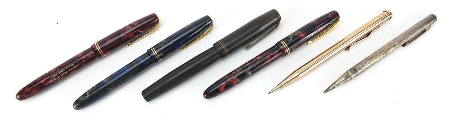 Vintage fountain pens and propelling pencils including three marbleised Burnham fountain pens with