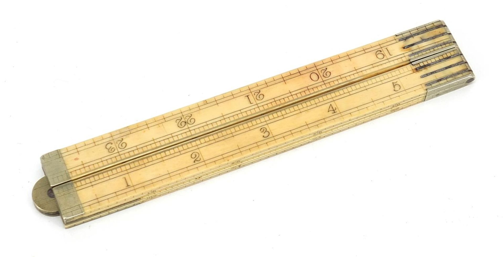 19th century ivory folding rule by W H Archer of Goodge St London, 16cm in length when closed