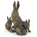 German cold painted bronze group of a hare and three bunnies, impressed Geschutzt to the base of