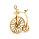 9ct gold penny farthing charm with spinning wheel, 2.1cm high, 1.5g