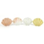 Four Art Deco glass light shades in the form of shells, each approximately 25cm wide