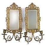 Pair of early 20th century ornate brass girondelle wall mirrors, each 40cm high