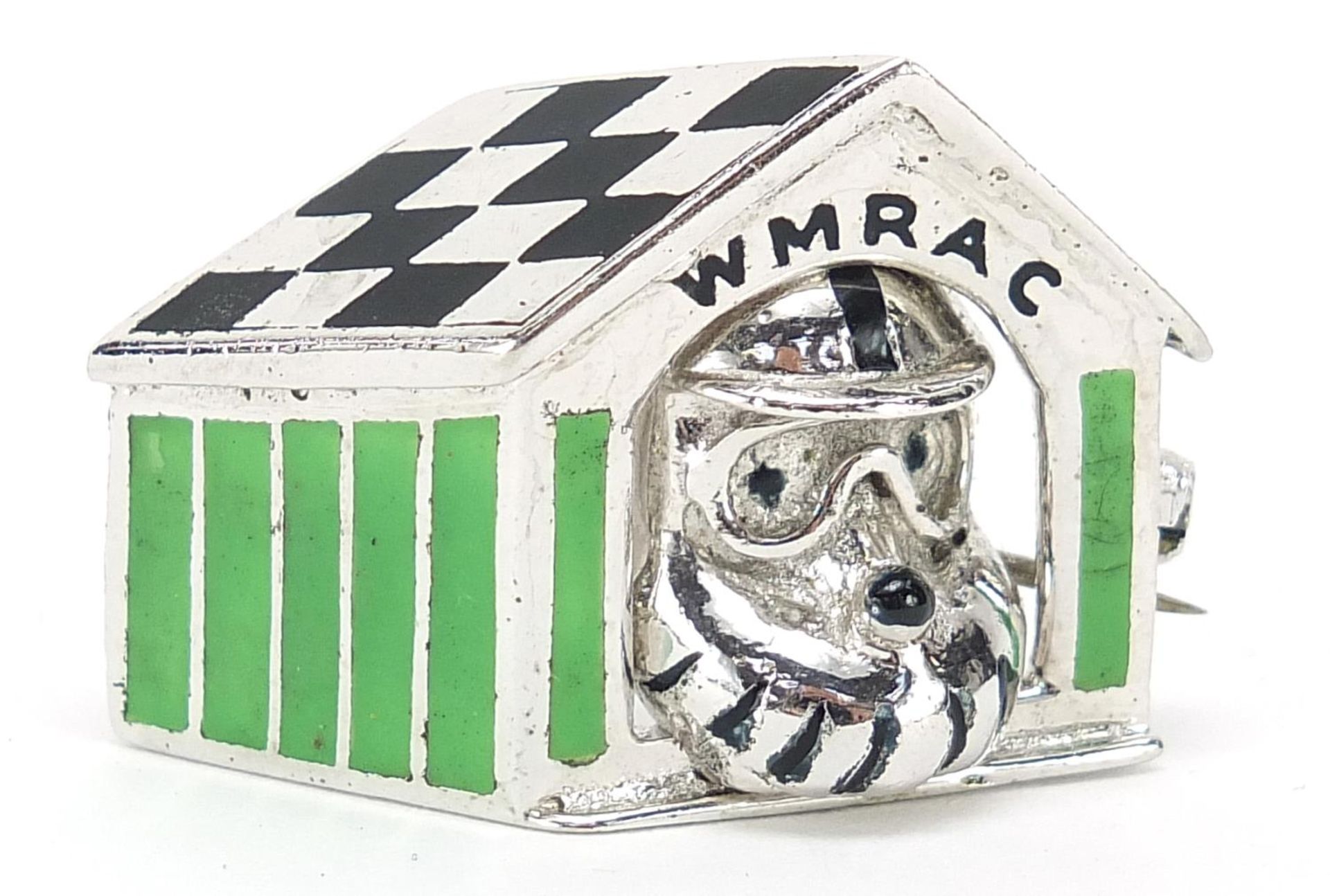 Rare motoring interest silver and enamel lapel badge relating to The Women's Motor Racing Associates