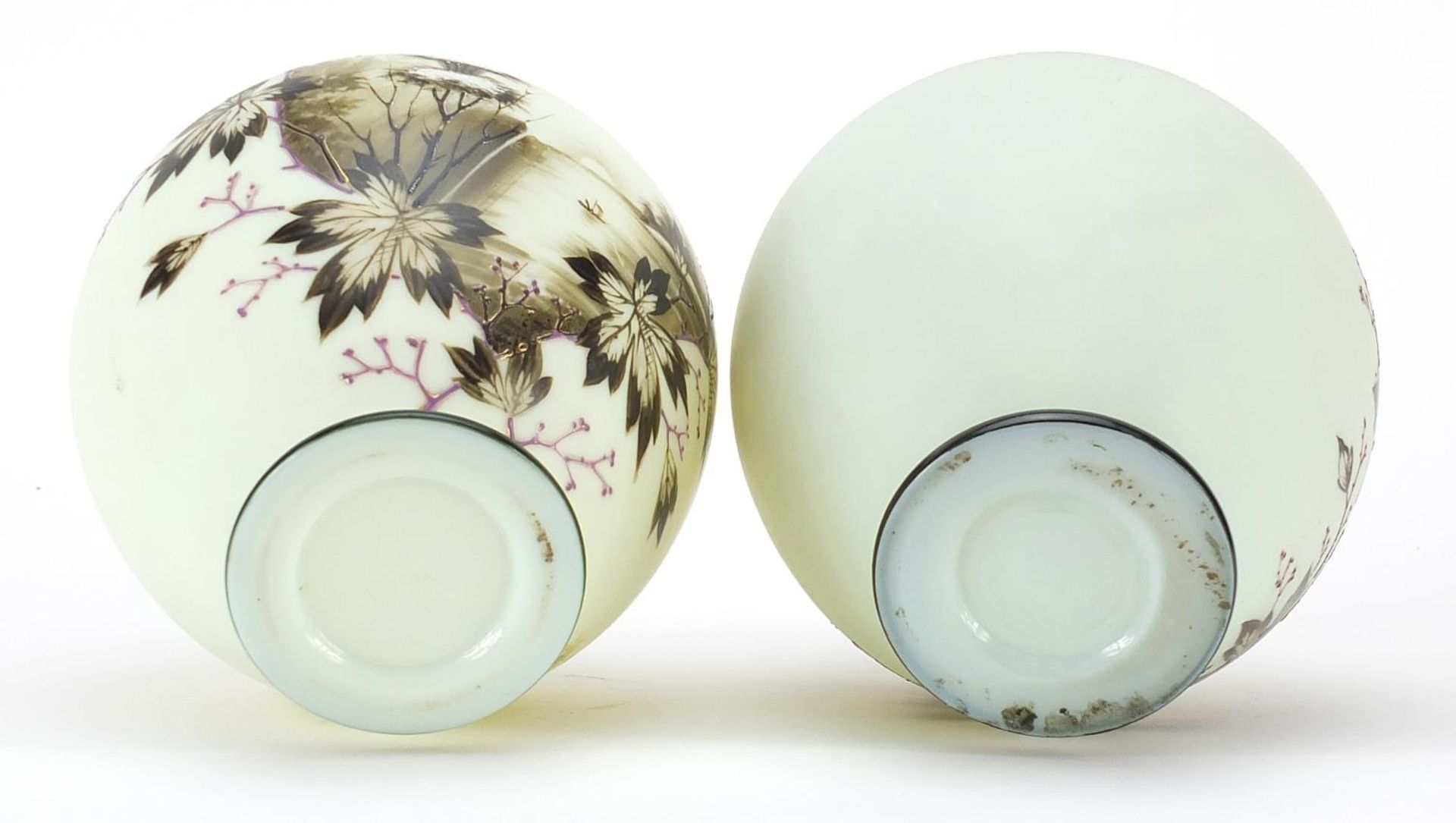 Pair of 19th century opaline glass vases hand painted with trees beside water within floral borders, - Image 3 of 3