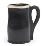 Early 20th century leather Black Jack jug with silver rim, impressed Ross Winchester to the base,
