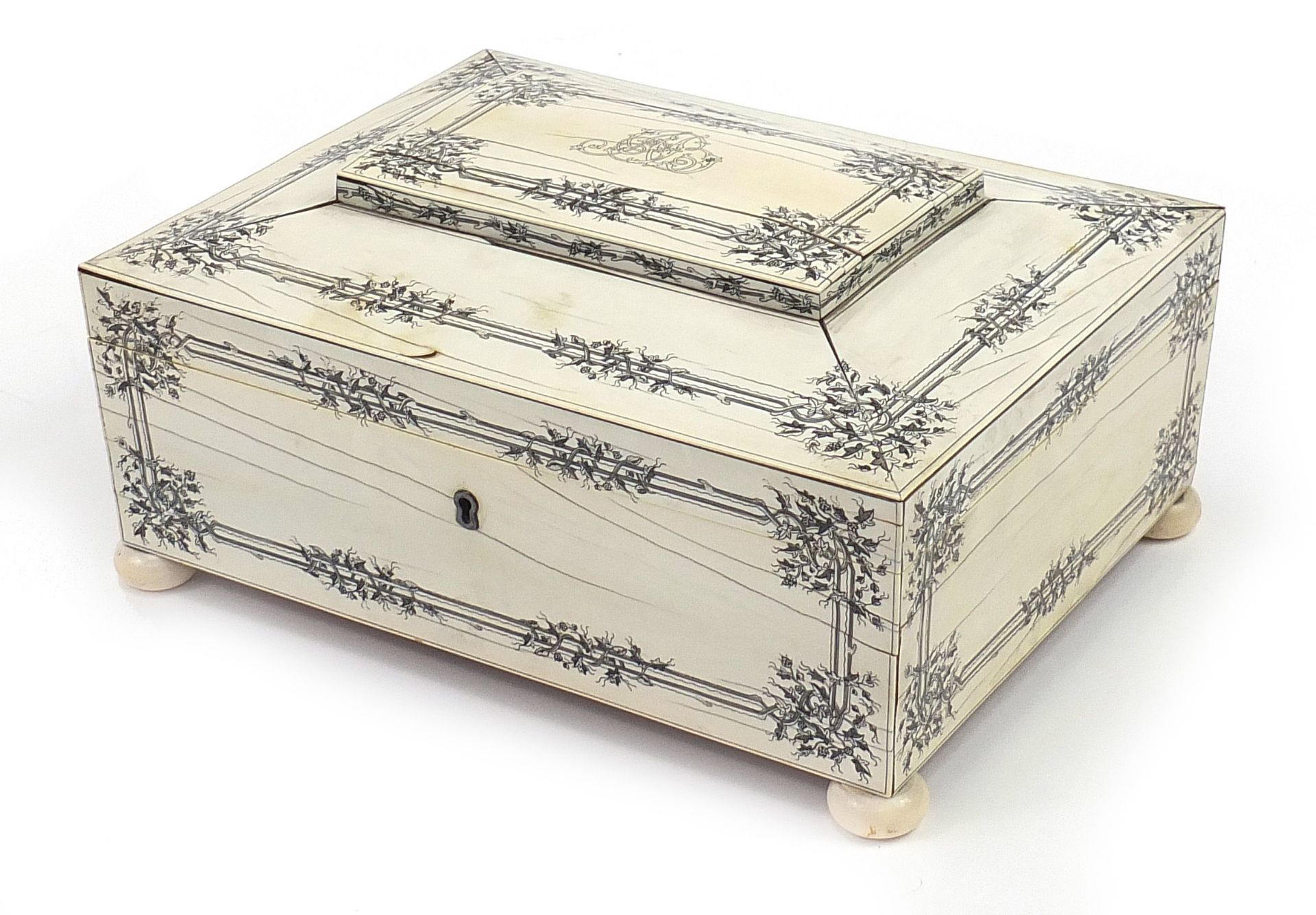 Good Anglo Indian sandalwood, ivory and penwork sarcophagus shaped sewing box with fitted lift out