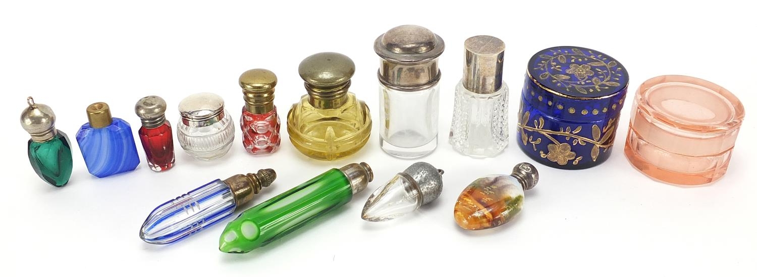 Victorian and later scent bottles, jars and trinkets, some with silver lids, including a continental