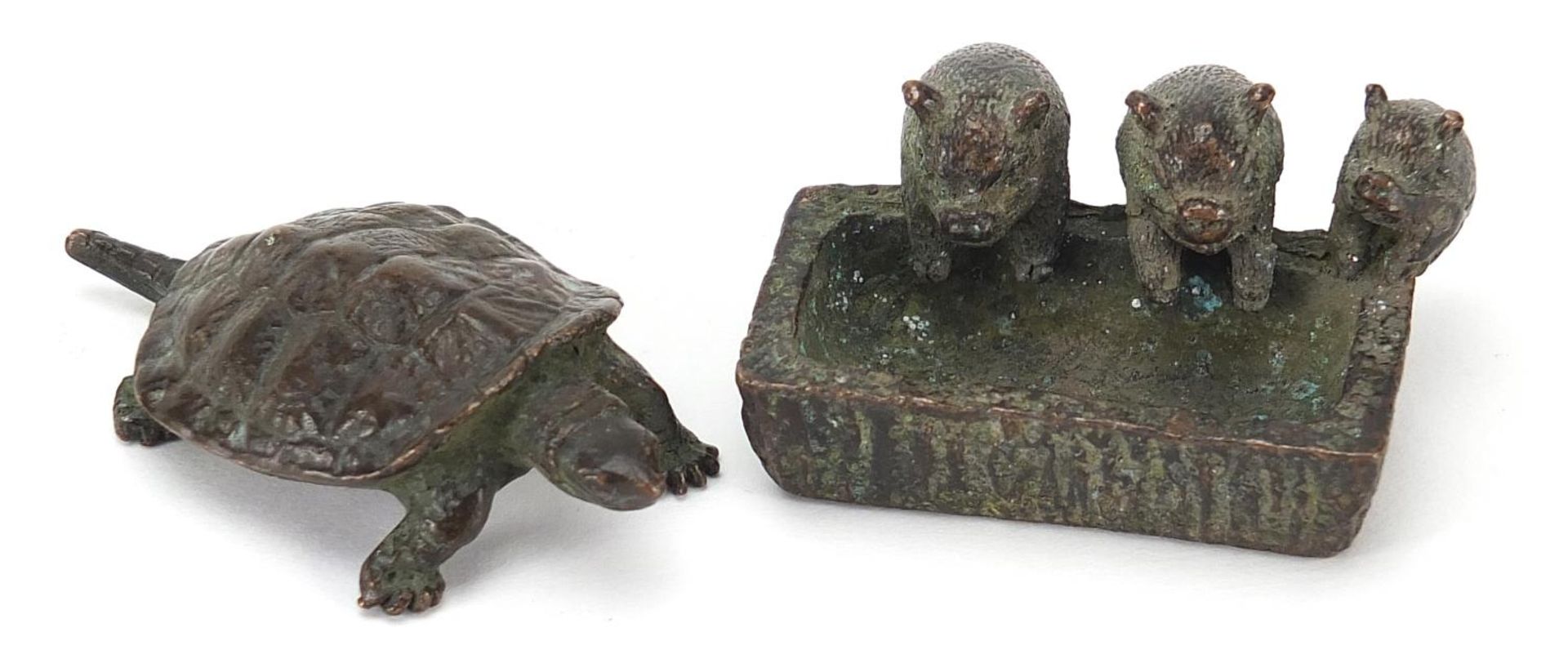 Two Japanese patinated bronze animals comprising terrapin and three pigs at a trough, the largest
