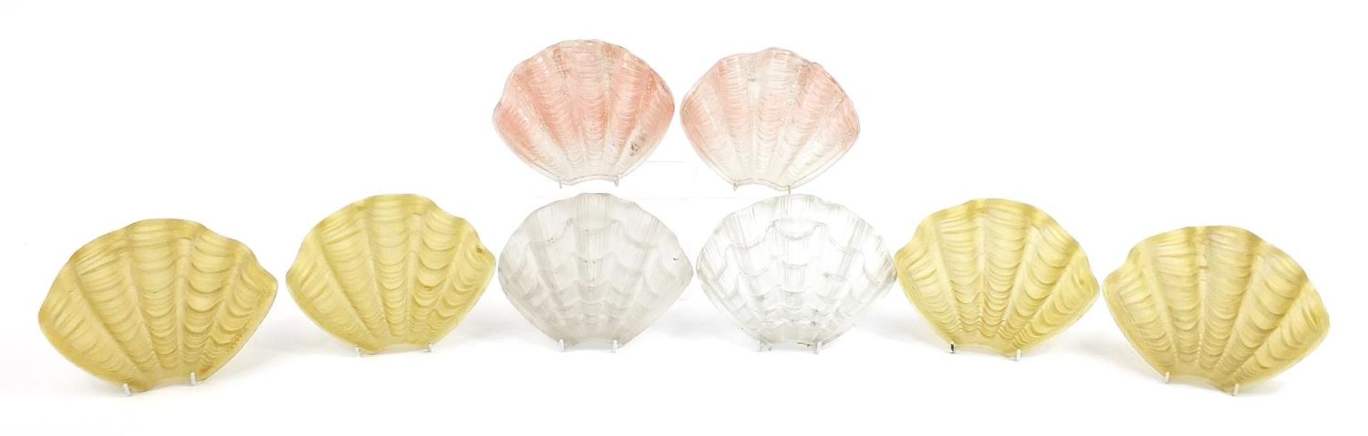 Four pairs of Art Deco glass light shades in the form of shells, each approximately 25cm wide