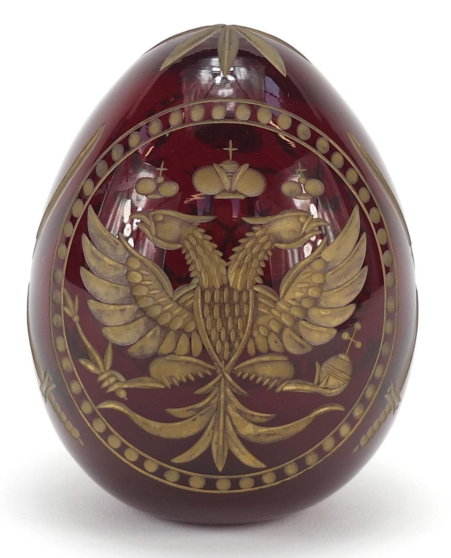Russian red glass egg paperweight in the style of Faberge, etched with double headed eagle and