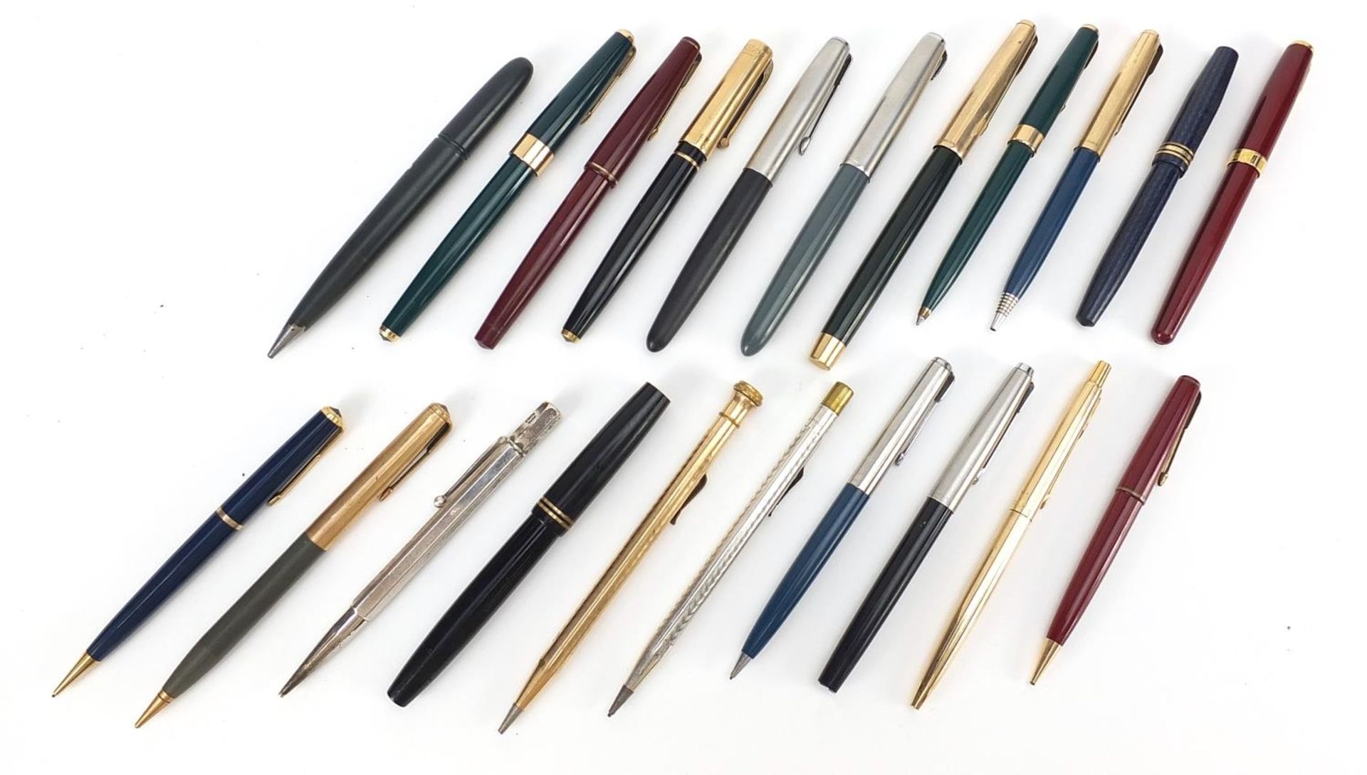 Vintage and later fountain pens, ballpoint pens and two silver propelling pencils, including