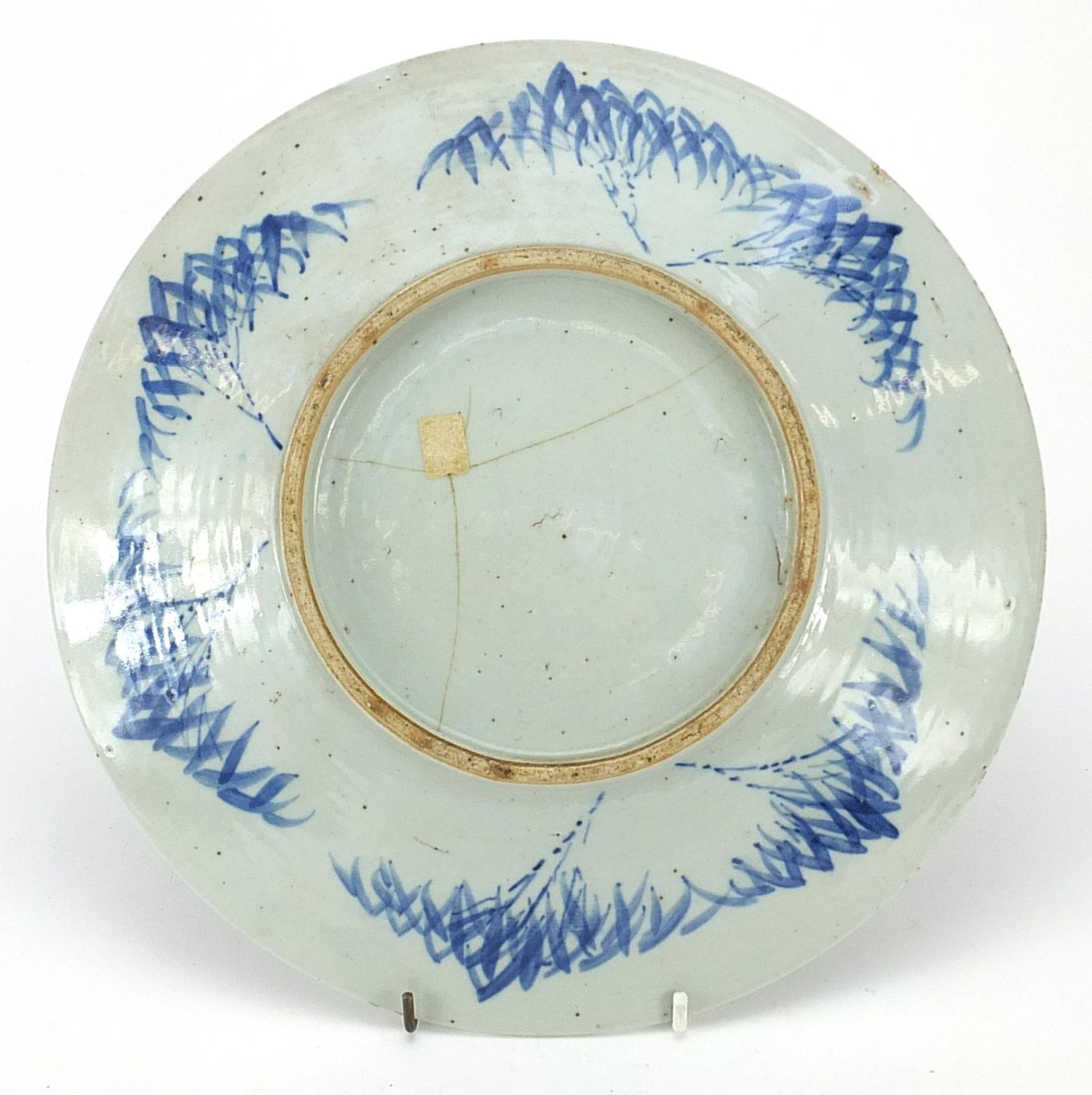 Chinese blue and white porcelain plate hand painted with a bird and butterflies amongst flowers, - Image 2 of 2