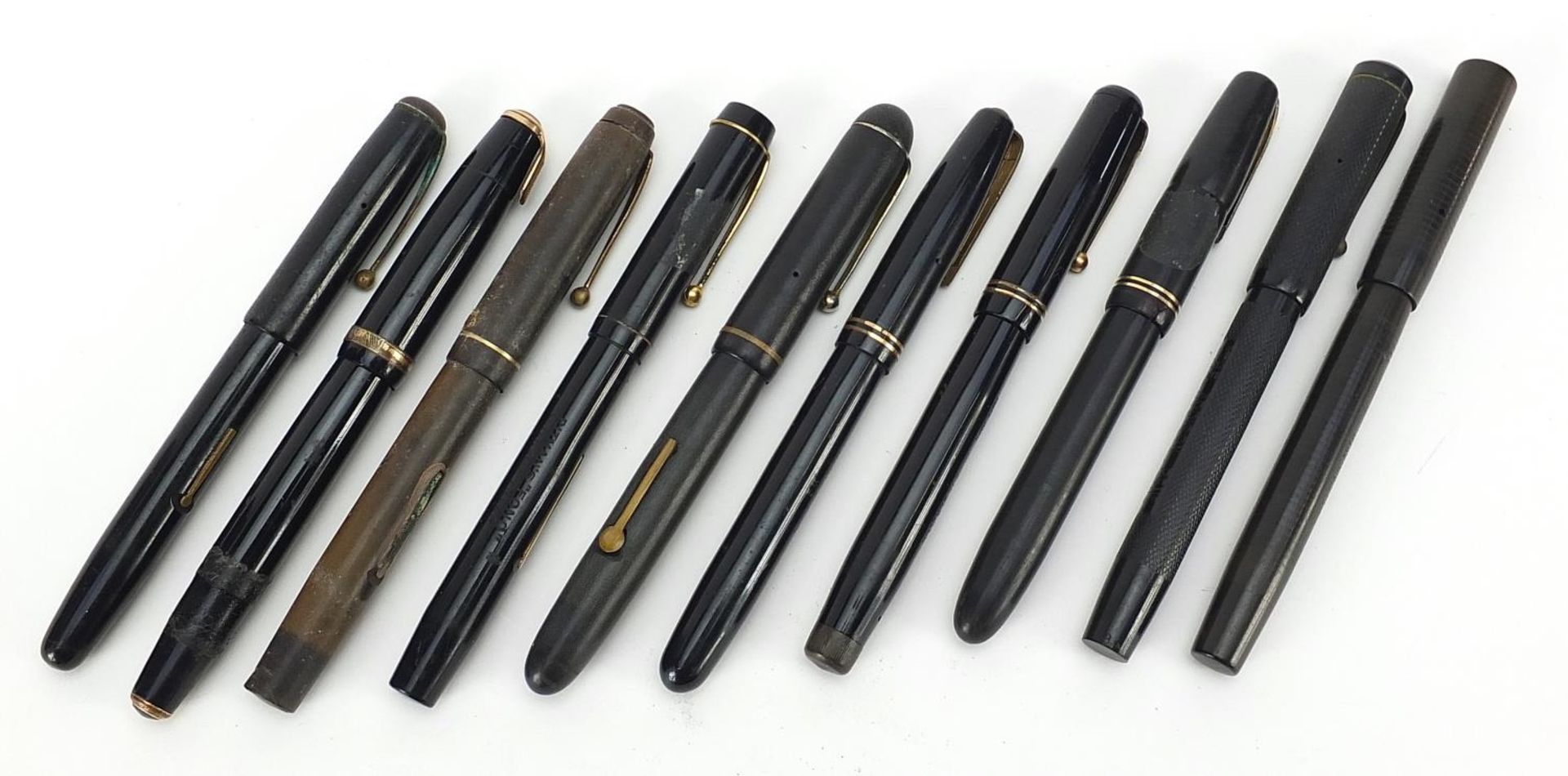 Ten vintage fountain pens with gold nibs including Swan self filler, Burnham, Watermans and Parker