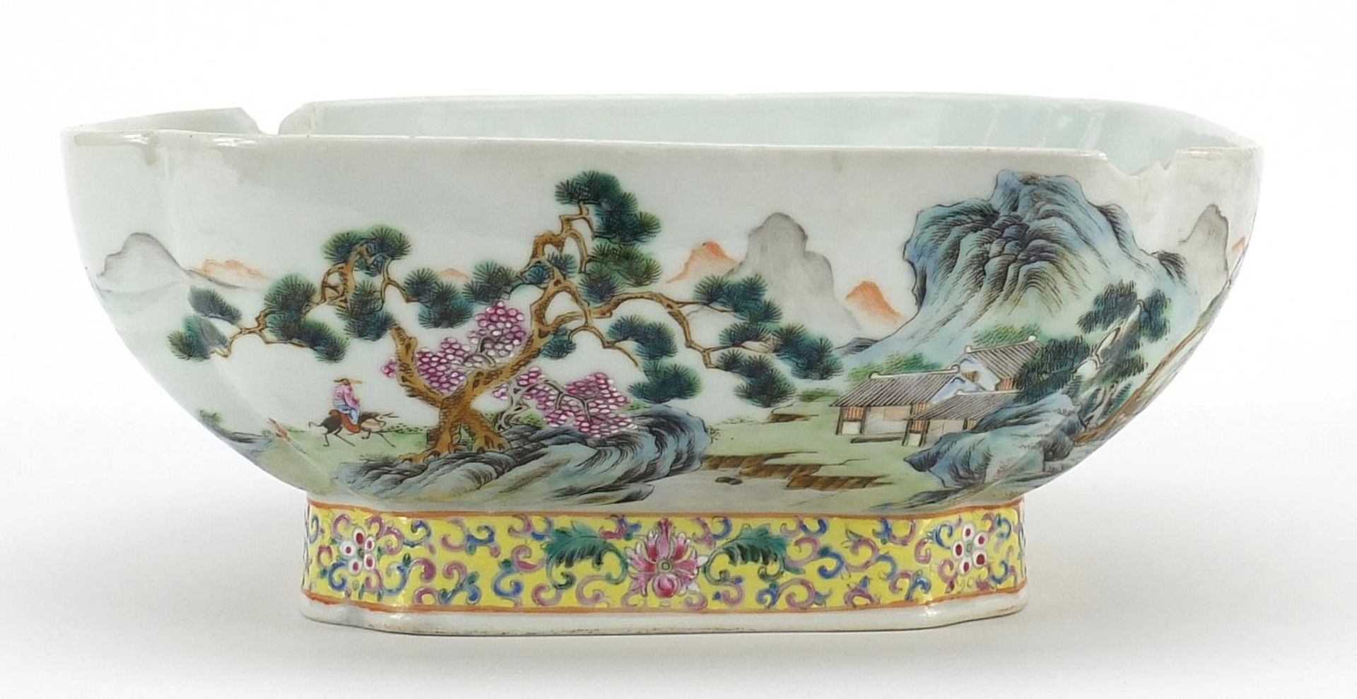 Chinese porcelain bowl hand painted in the famille rose palette with a river landscape