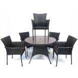 Rattan garden table with four chairs, the table 75cm high x 107cm in diameter