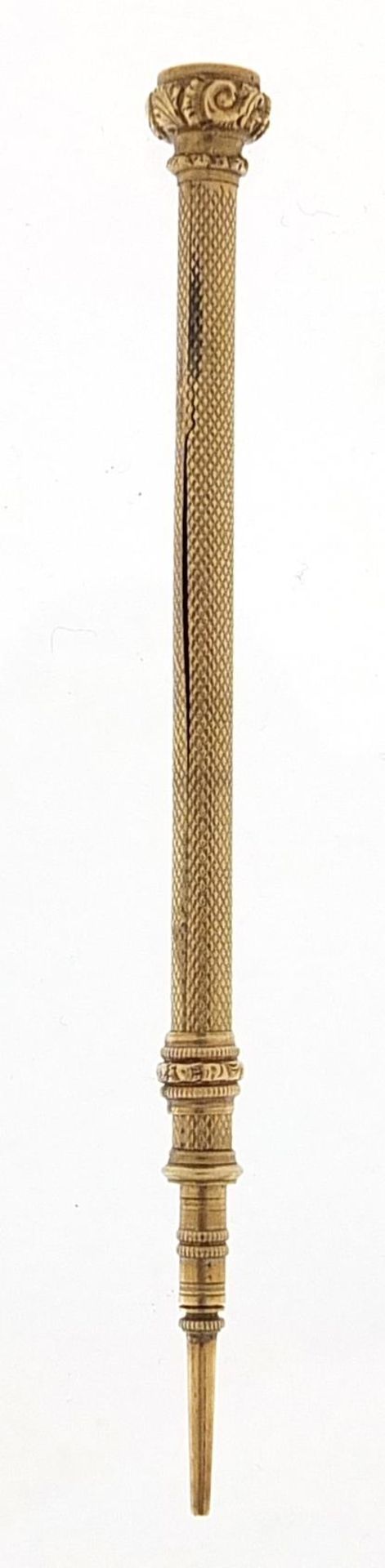 Gold coloured metal propelling pencil set with an amethyst, 9.5cm in length, 6.0g - Image 2 of 3