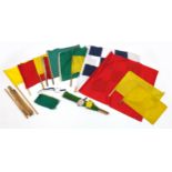 Collection of railway signaling flags and and three enamelled metal armbands including British