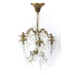 Brass six branch centrepiece light fitting with cut glass drops 60cm high