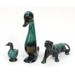 Blue mountain pottery ducks and a cougar, the largest 30cm high