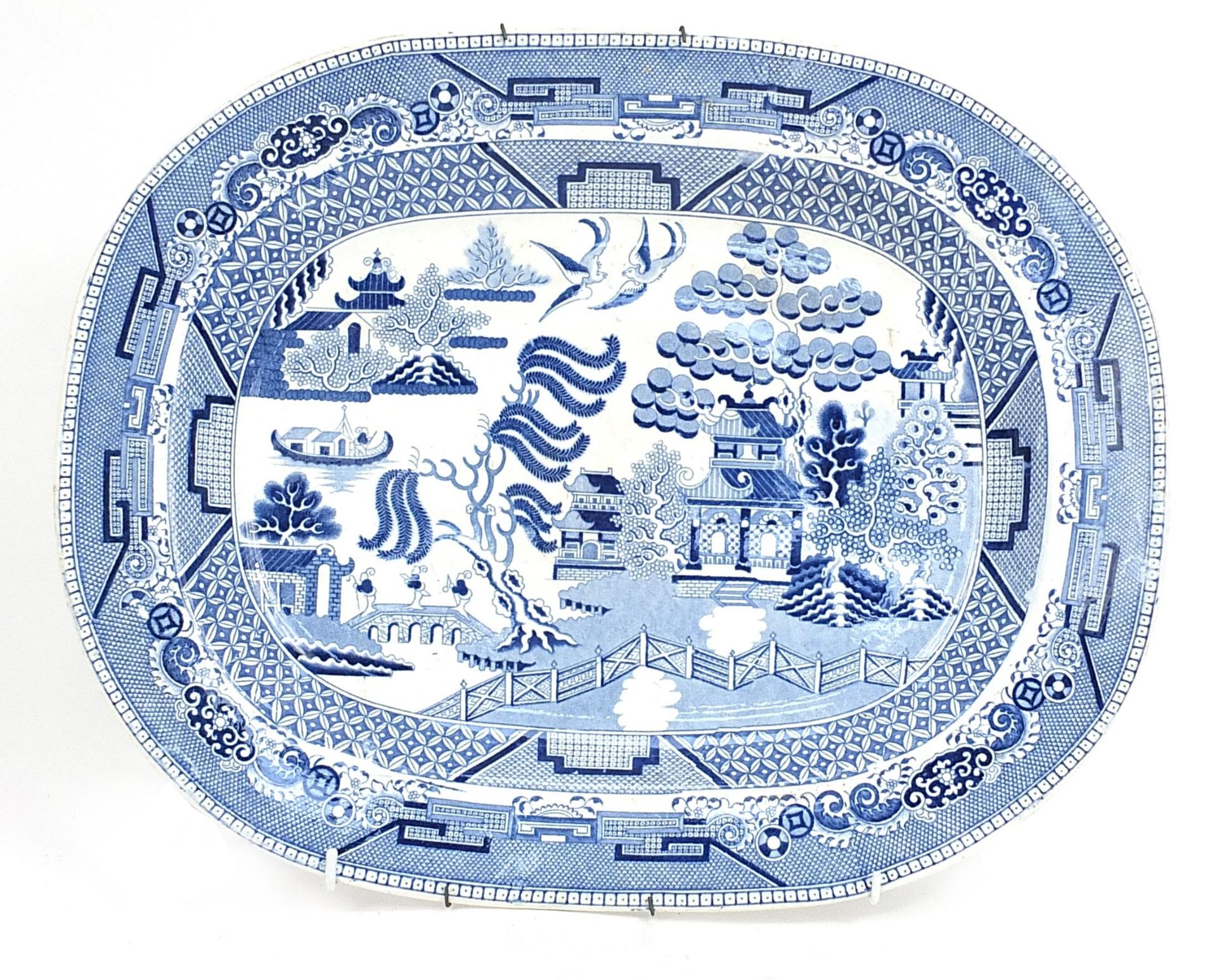 Early Victorian blue and white Willow pattern pottery meat plate, 44cm x 35cm