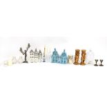 Selection of candleholders including metal houses, birdcage, Dutch style houses, cherub candleholder