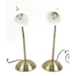 Pair of gilt metal student Anglepoise lamps with white glass shades, 43cm high