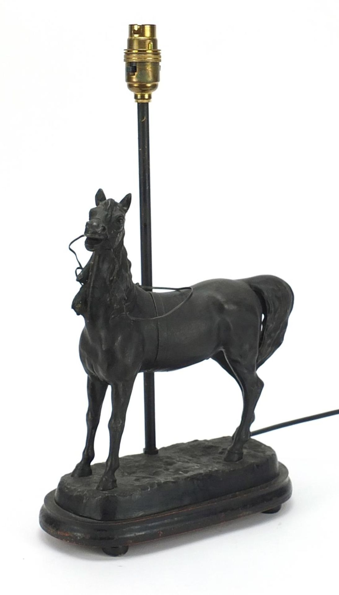 Patinated spelter horse design table lamp with ebonised base, 42cm high