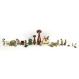 Collectable china and pottery animals including Jema style dogs, chicken egg basket and birds, the