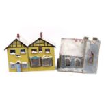 Snowy covered wooden model of a church with antique and grocery shop and interior lights, the church