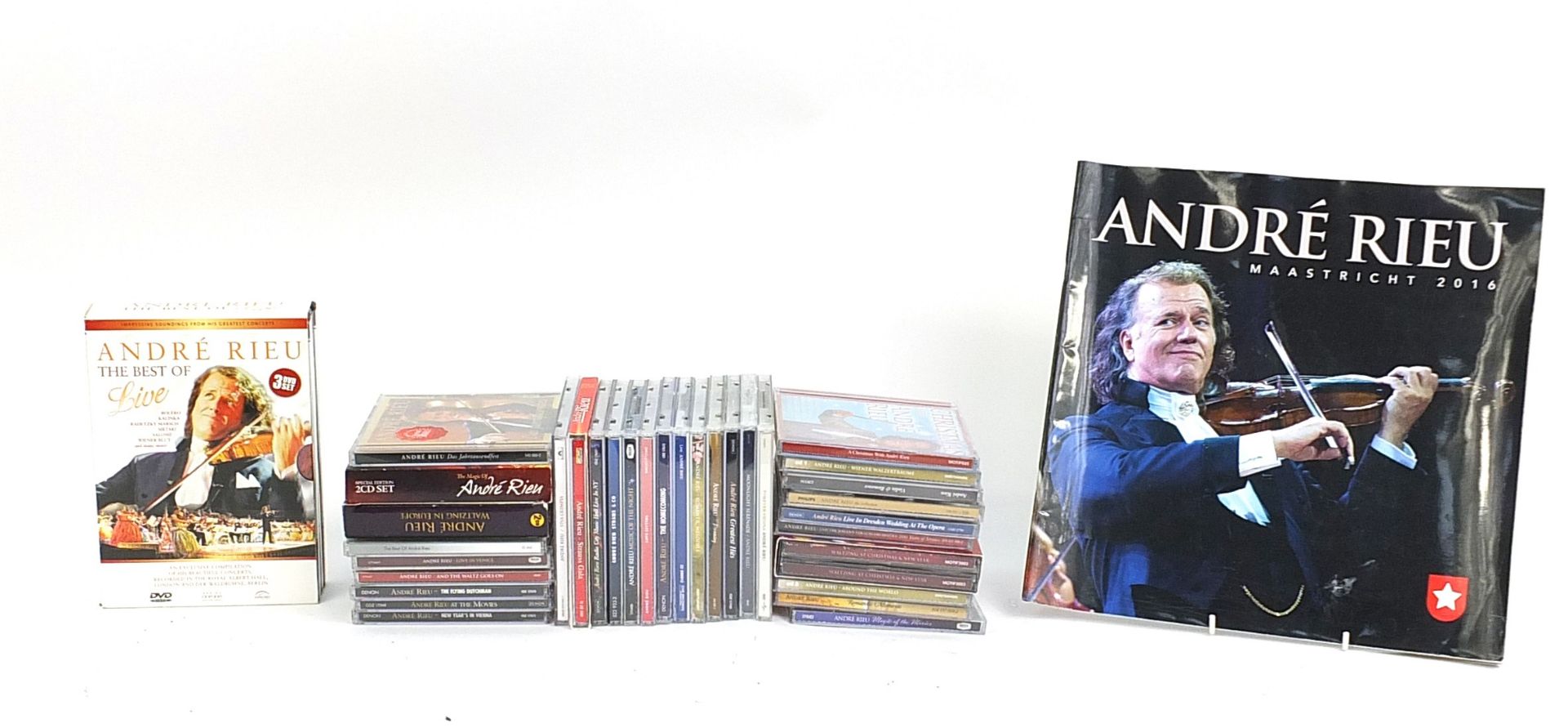 Selection of the celebrity violinist Andre Rieu CD's, DVDs and a Maastricht 2016 programme