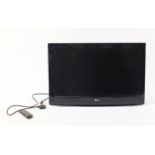 LG 32 inch LCD TV with a universal control