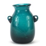 Antique green glass vase with twin handles, 12.5cm high