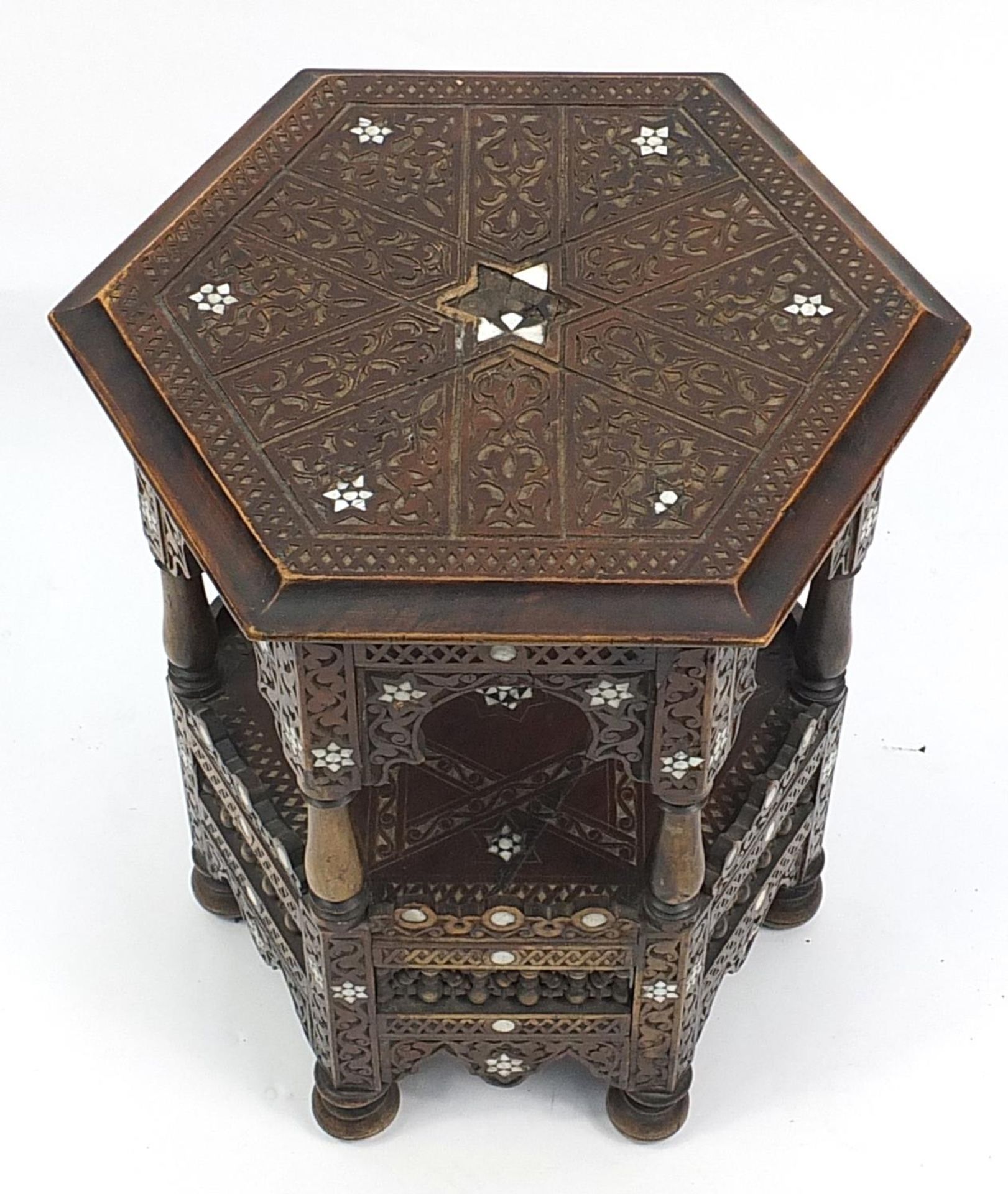 Manner of Liberty & Co, Moorish hexagonal occasional table with mother of pearl inlay, carved with - Image 2 of 3