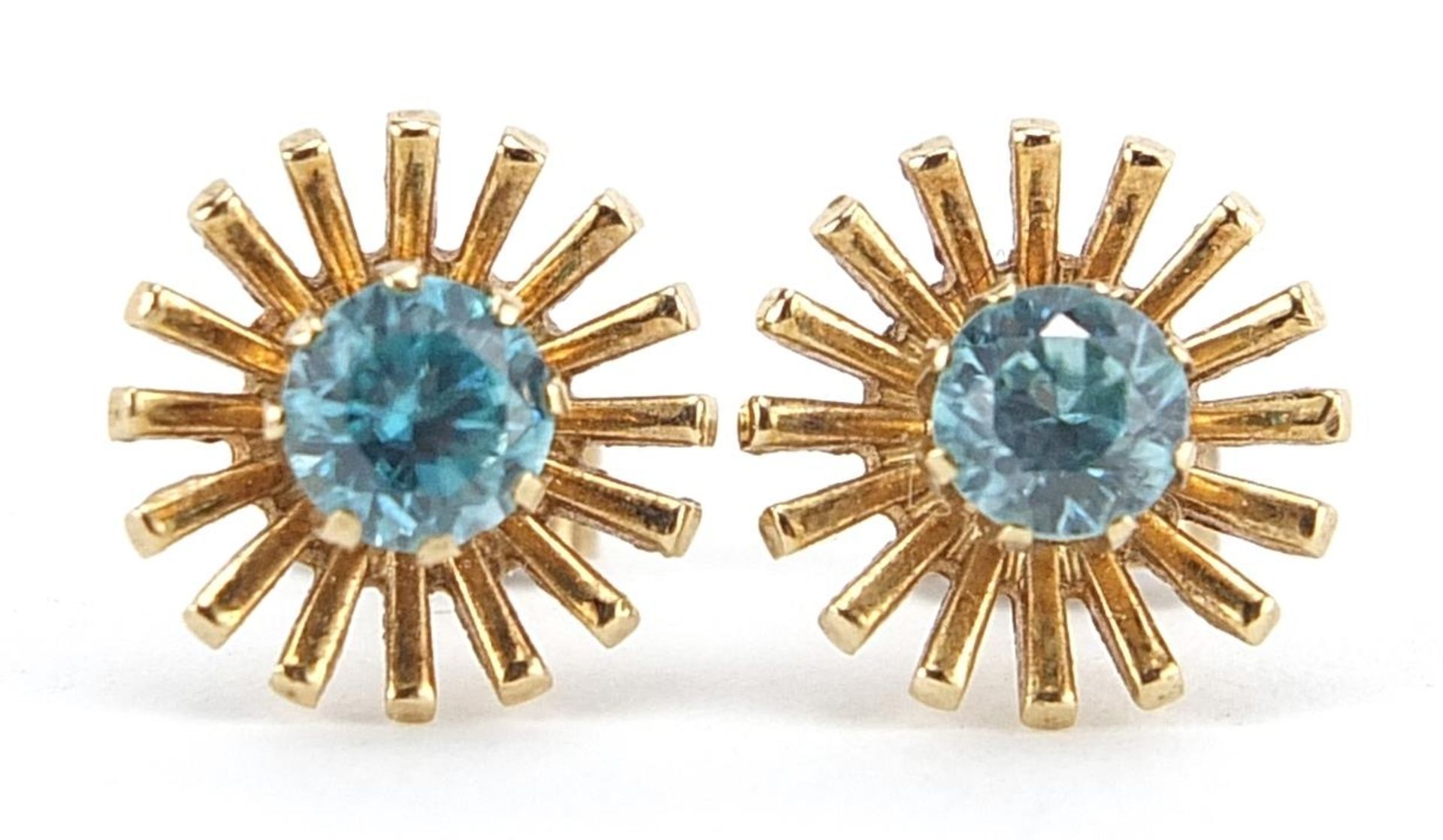 Pair of 9ct gold blue stone solitaire stud earrings, possibly aquamarine, housed in a Chas Hart &