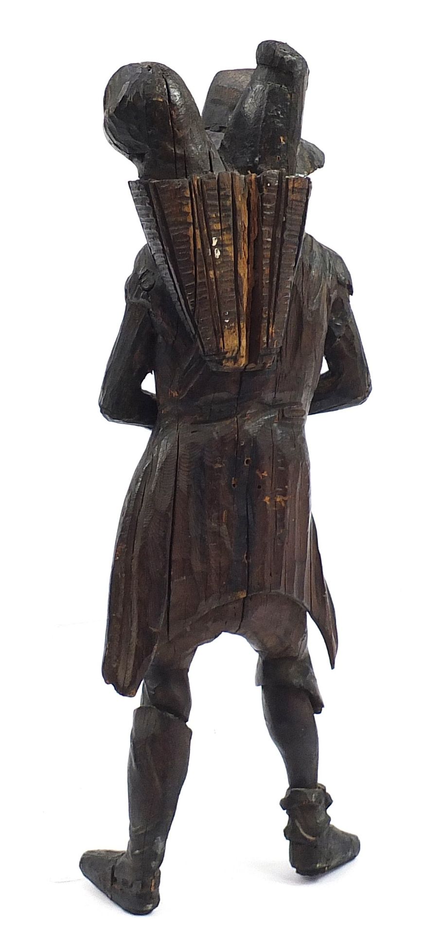Antique oak carving of a man holding a sack, 61cm high - Image 2 of 3