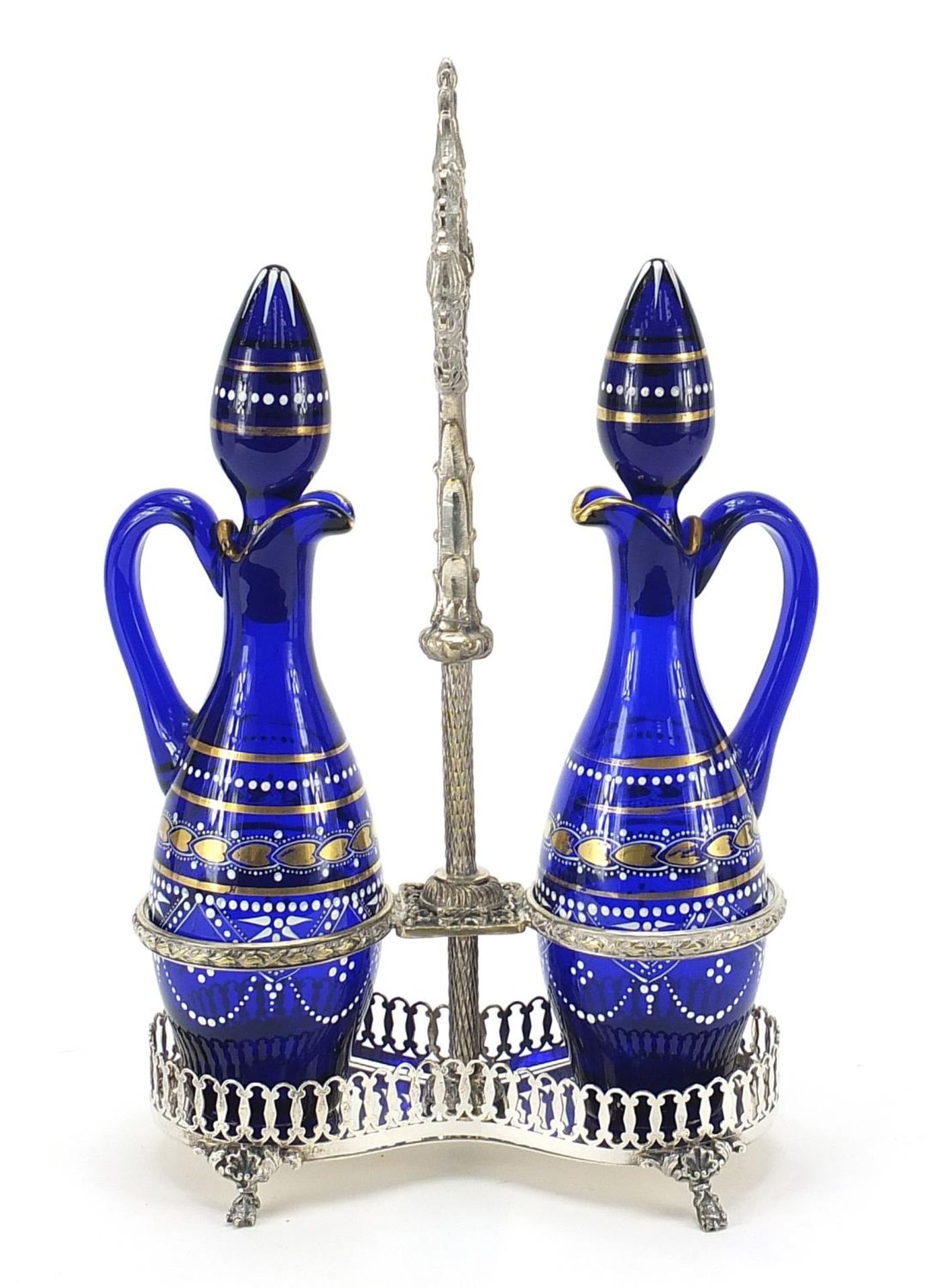 Silver plated oil and vinegar bottle stand with blue glass decanters, 35cm high