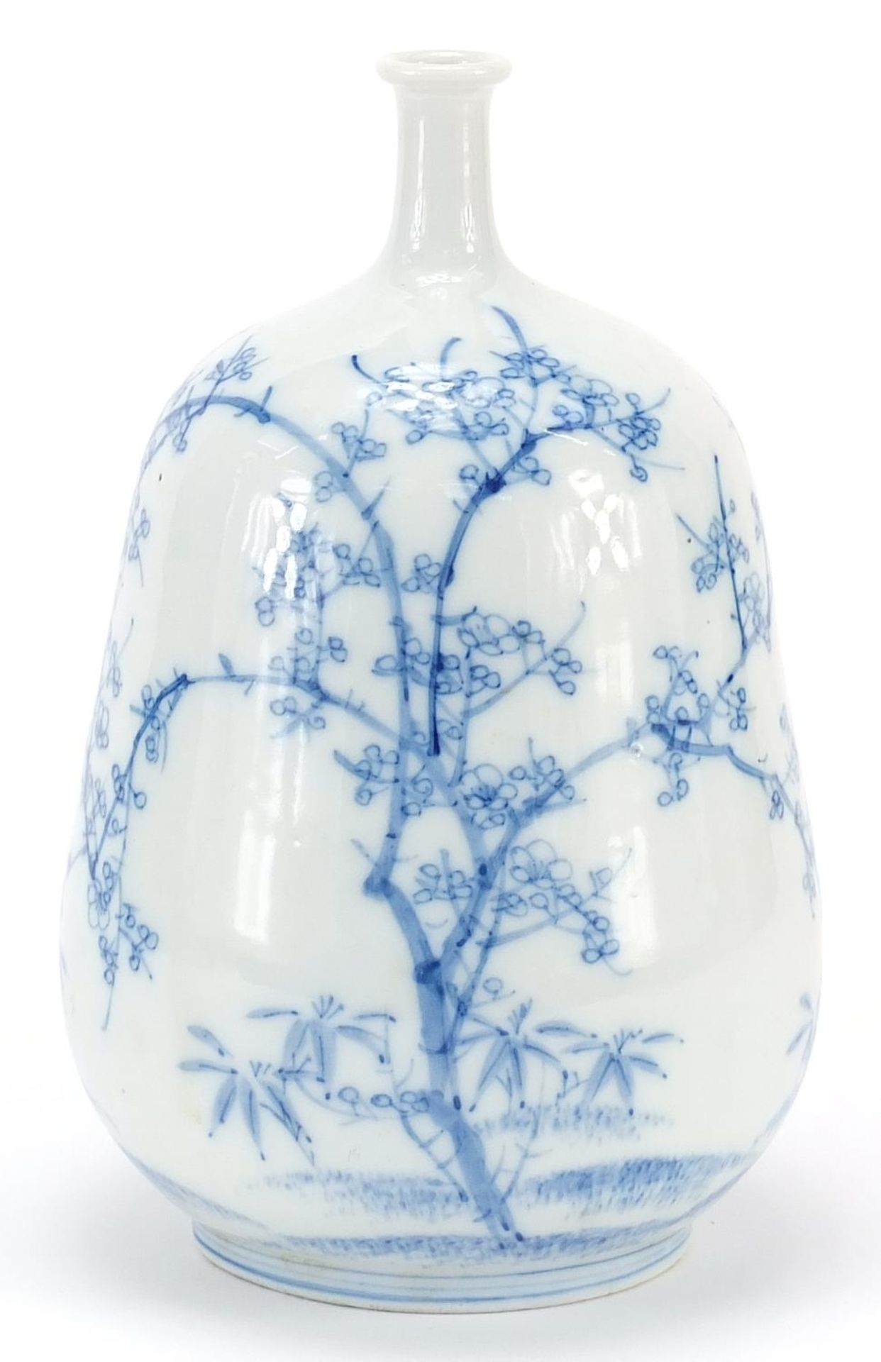 Japanese blue and white porcelain vase hand painted with trees, 23.5cm high