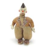 Early 20th century toy clown with terracotta head and hands, 27cm high