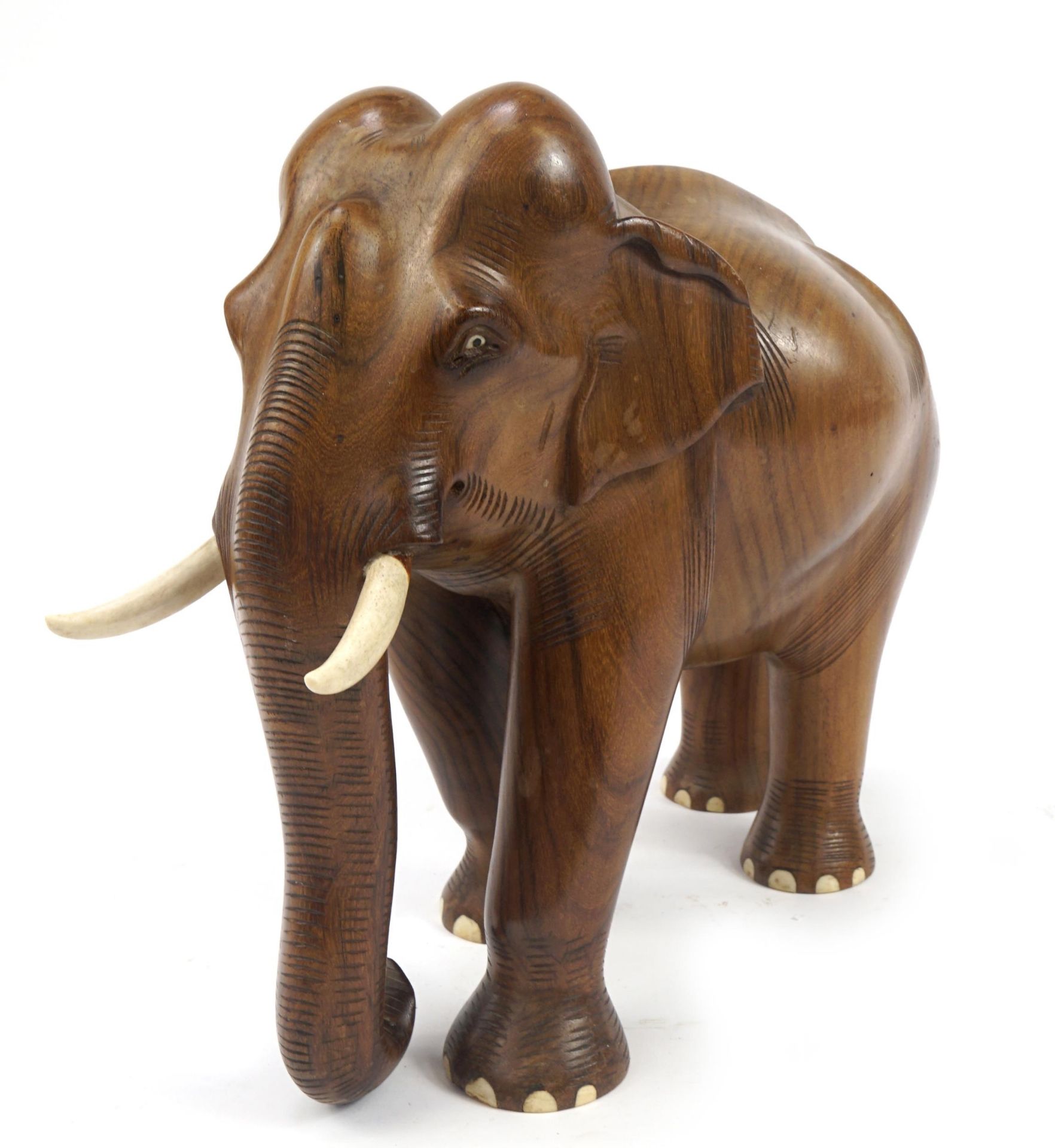 Large African hardwood carving of an elephant, 39cm in length