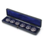 Joseph Henry Raymond, set of six silver buttons with fitted case, London 1902, each 2.4cm in