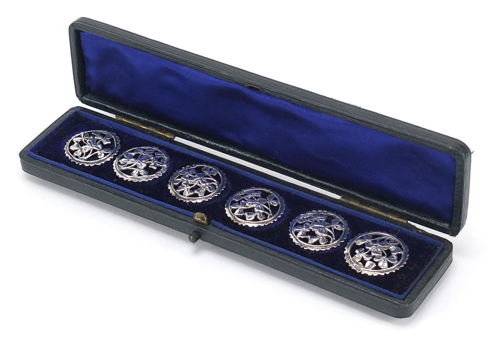 Joseph Henry Raymond, set of six silver buttons with fitted case, London 1902, each 2.4cm in