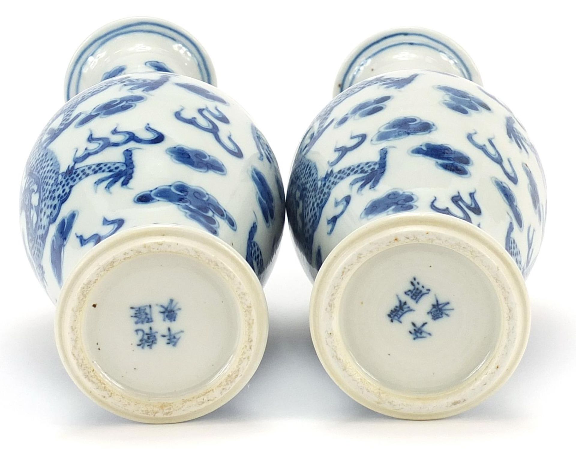 Pair of Chinese blue and white porcelain vases hand painted with dragons amongst clouds, four figure - Image 3 of 4