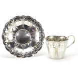 WMF, German Art Nouveau cup and saucer embossed with stylised flowers, the saucer 14cm in diameter