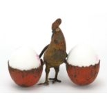 Cold painted spelter egg stand in the form of a cockerel, 12.5cm wide