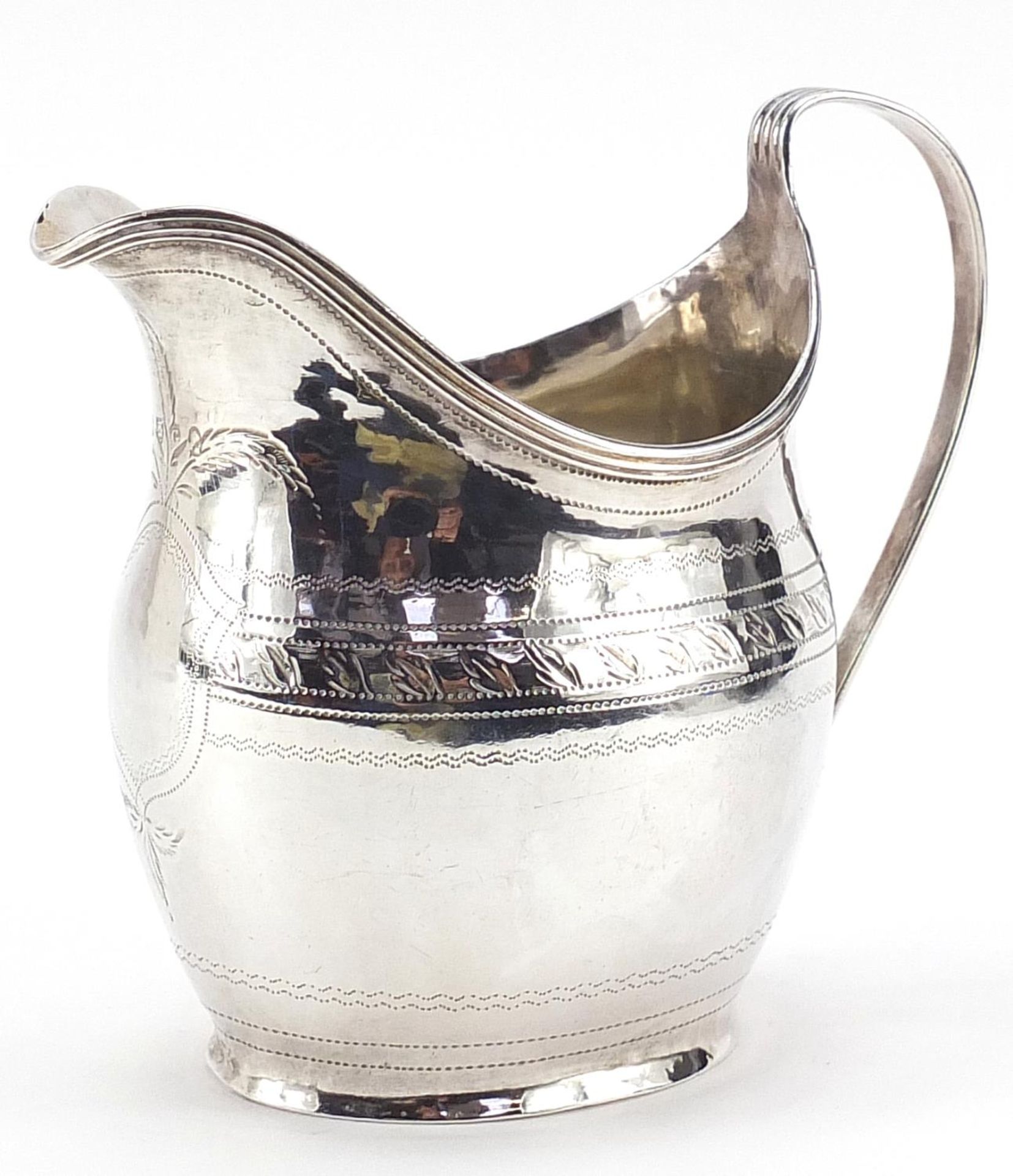 George III silver cream jug with blank cartouche, indistinct maker's mark, London 1802, 10cm high,