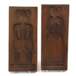 Two rectangular wooden moulds carved with figures in Elizabethan dress, each 38cm x 15.5cm