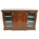 Inlaid breakfront bookcase with a pair of glazed doors, central cupboard door and gilt metal mounts,