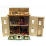 Large wooden doll's house with furniture and electric wiring, 69cm H x 56cm W x 37cm D