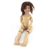 Simon & Halbig, German bisque headed doll with jointed limbs, 50cm high